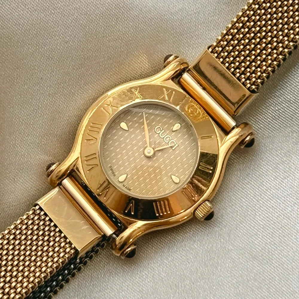 Gucci Gold Mesh Bracelet Watch with Roman Dial